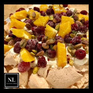 orange raspberry & Pistachio pavlova